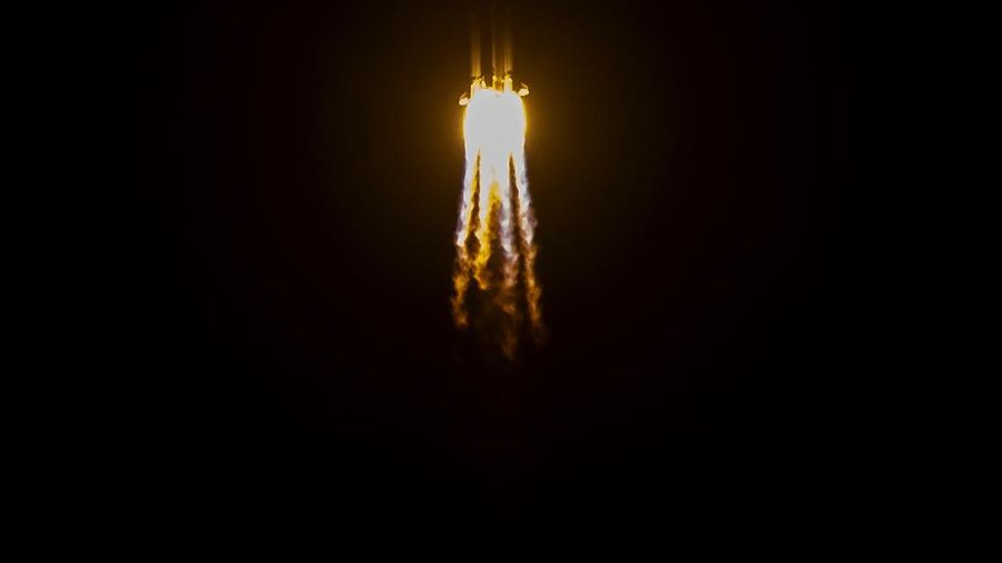 A Long March-5 rocket carrying the Chang'e 5 lunar mission lifts off at the Wenchang Space Launch Center in Wenchang in southern China's Hainan province, early Tuesday, Nov. 24, 2020. China's trip to the moon and, presumably, back is the latest milestone in the Asian powerhouse's slow but steady ascent to the stars. (AP Photo/Mark Schiefelbein, File)