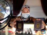 Kelakuan The Fed Meredupkan Kilau Harga Emas