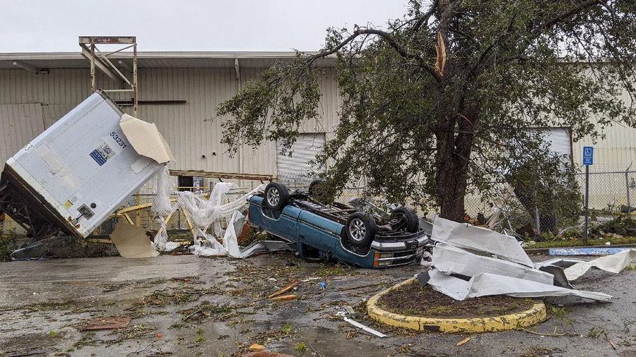 Damage is seen after a possible tornado touched down in the area Wednesday, Dec. 16, 2020, in Pinellas Park, Fla. (Douglas R. Clifford/Tampa Bay Times via AP)