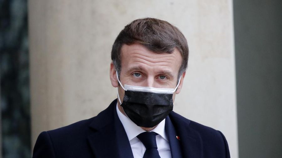 France's President Emmanuel Macron delivers a speech during a Citizens' Convention on Climate, in Paris, Monday, Dec. 14. (AP Photo/Thibault Camus, Pool)