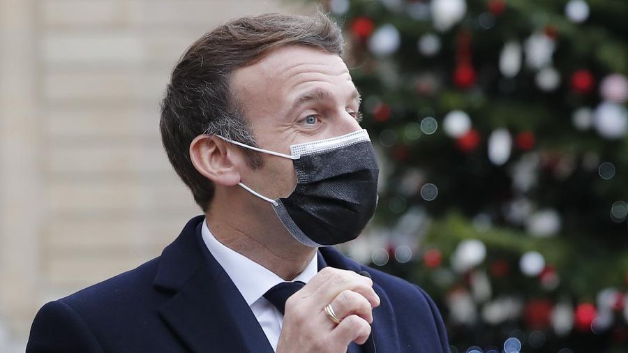 France's President Emmanuel Macron delivers a speech during a Citizens' Convention on Climate, in Paris, Monday, Dec. 14. (AP Photo/Thibault Camus, Pool)