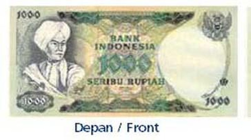 Uang Rp 100 Tahun Emisi 1977 gambar badak bercula satu. (dok. bi.go.id)