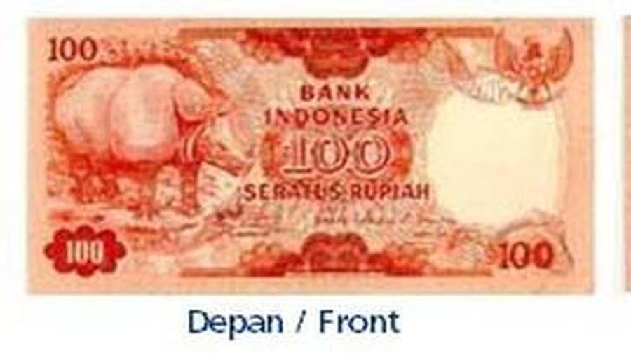 Uang Rp 100 Tahun Emisi 1977 gambar badak bercula satu. (dok. bi.go.id)