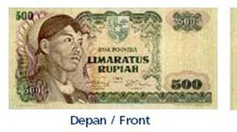 Uang Rp 100 Tahun Emisi 1977 gambar badak bercula satu. (dok. bi.go.id)