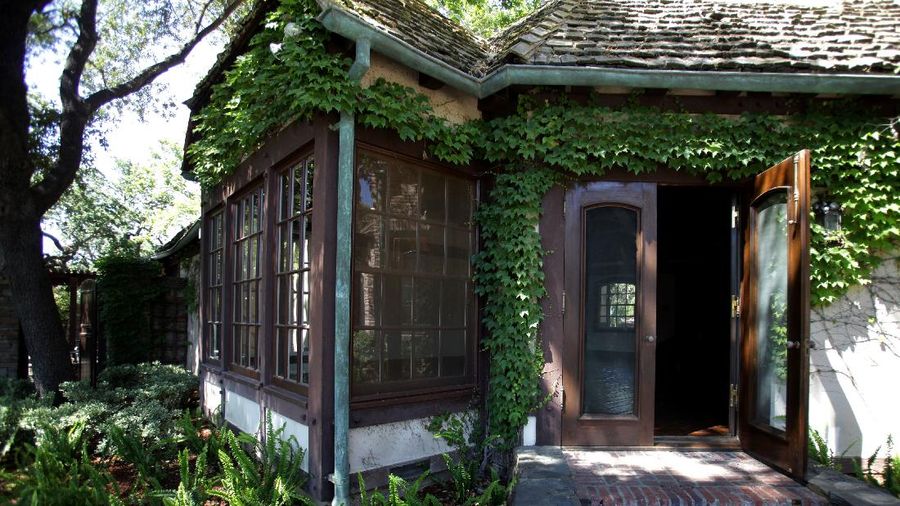 FILE - This Dec. 17, 2004, file photo shows the rear entrance to pop star Michael Jackson's Neverland Ranch home in Santa Ynez, Calif. Jackson’s Neverland Ranch has found a new owner in billionaire businessman Ron Burkle.  Burkle’s spokesman said in an email Thursday, Dec. 24, 2020, that Burkle bought the 2,700-acre property near Santa Barbara, California. (AP Photo/Mark J. Terrill, file)