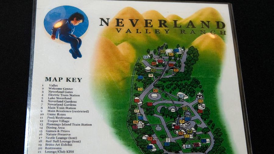FILE - This Dec. 17, 2004, file photo shows the rear entrance to pop star Michael Jackson's Neverland Ranch home in Santa Ynez, Calif. Jackson’s Neverland Ranch has found a new owner in billionaire businessman Ron Burkle.  Burkle’s spokesman said in an email Thursday, Dec. 24, 2020, that Burkle bought the 2,700-acre property near Santa Barbara, California. (AP Photo/Mark J. Terrill, file)