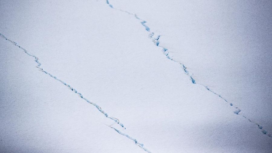 In this recent handout photo provided by the Ministry of Defense on Wednesday, Dec. 23, 2020 fragments break off from one of the largest recorded icebergs, called the A68a, floating near the island of South Georgia in the South Atlantic. (Corporal Phil Dye/Ministry of Defence via AP)