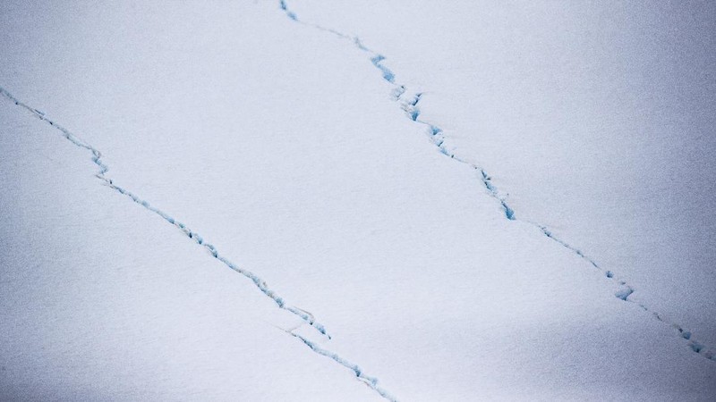 In this recent handout photo provided by the Ministry of Defense on Wednesday, Dec. 23, 2020 fragments break off from one of the largest recorded icebergs, called the A68a, floating near the island of South Georgia in the South Atlantic. (Corporal Phil Dye/Ministry of Defence via AP)