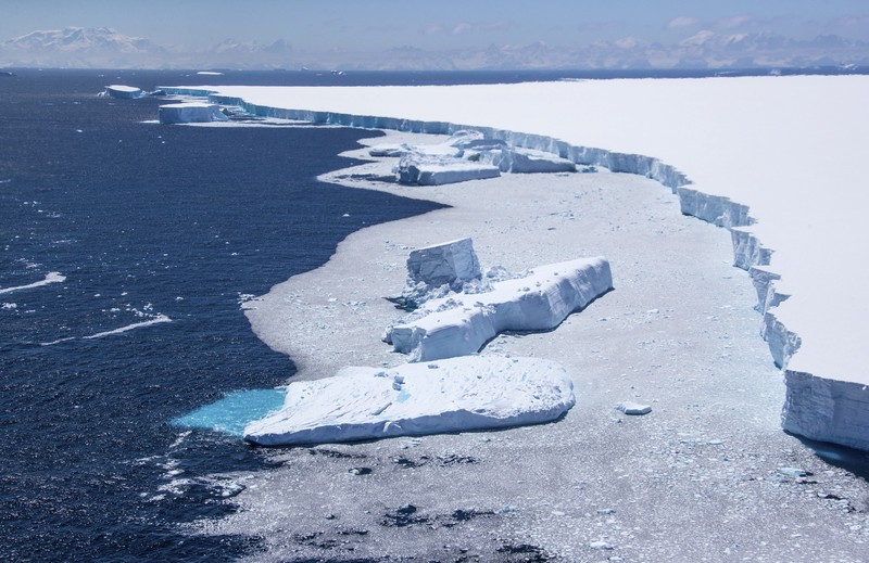 In this recent handout photo provided by the Ministry of Defense on Wednesday, Dec. 23, 2020 fragments break off from one of the largest recorded icebergs, called the A68a, floating near the island of South Georgia in the South Atlantic. (Corporal Phil Dye/Ministry of Defence via AP)
