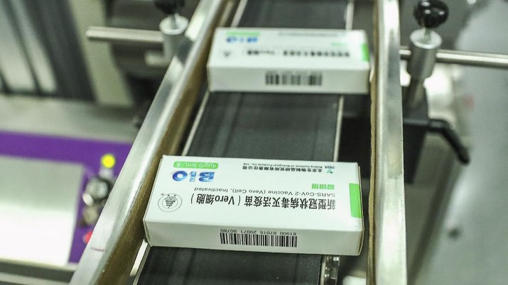 FILE - In this Dec. 25, 2020, file photo, released by Xinhua News Agency, packages of COVID-19 inactivated vaccine products are seen at a production plant of the Beijing Biological Products Institute Co., Ltd, a unit of state-owned Sinopharm in Beijing. China has given conditional approval to a coronavirus vaccine developed by state-owned Sinopharm. The vaccine is the first one approved for general use in China.(Zhang Yuwei/Xinhua via AP, File)