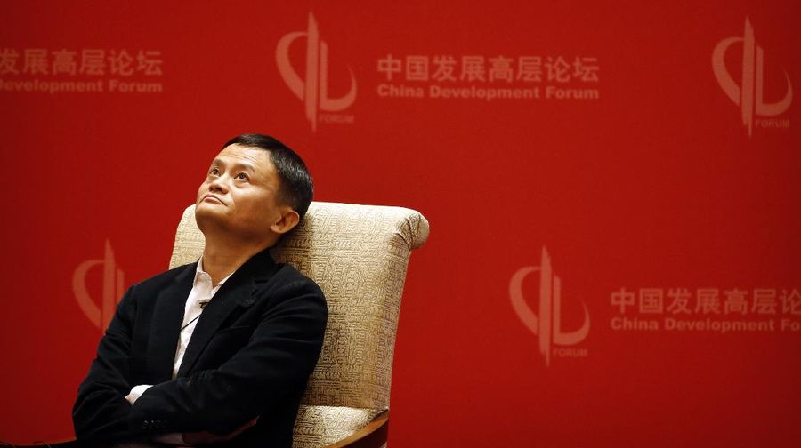 Jack Ma, executive chairman of the Alibaba Group, looks up during a panel discussion held as part of the China Development Forum at the Diaoyutai State Guesthouse in Beijing, Saturday, March 19, 2016. (AP Photo/Mark Schiefelbein)