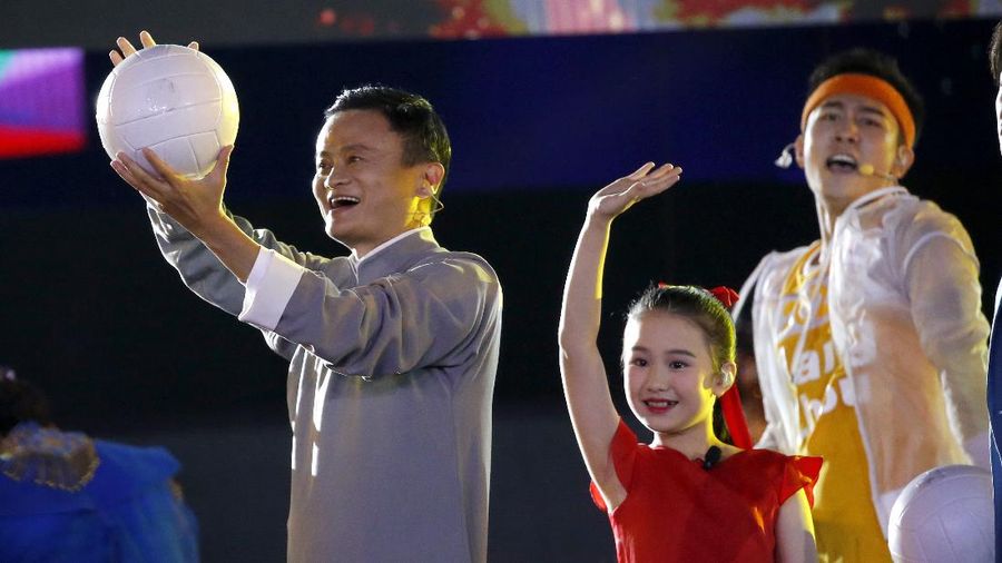 Jack Ma executive chairman of Alibaba Group prepares to hit a ball into the crowd during the closing ceremony for the 18th Asian Games in Jakarta, Indonesia, Sunday, Sept. 2, 2018. (AP Photo/Dita Alangkara)