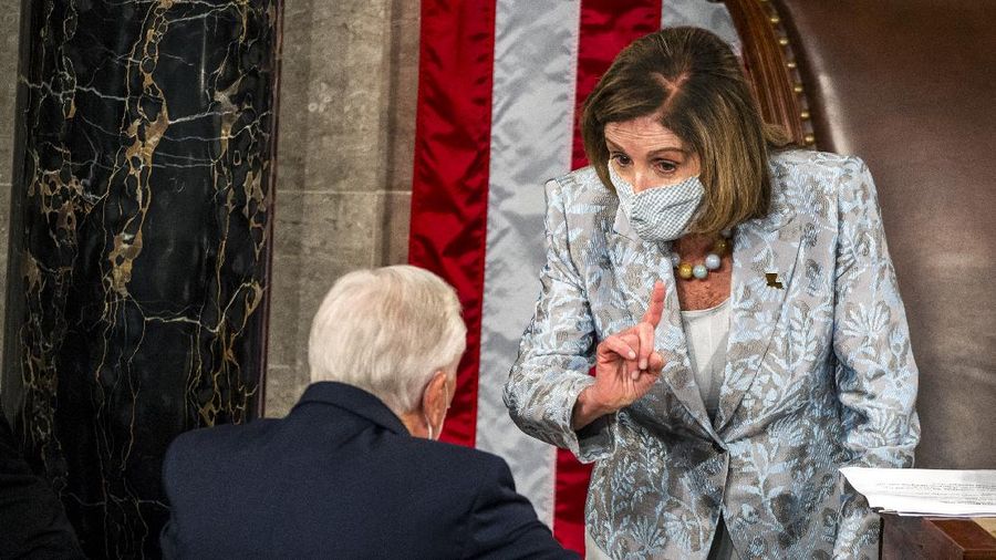 House Speaker Nancy Pelosi administers the oath of office to members of the 117th Congress at the U.S. Capitol in Washington, Sunday, Jan. 3, 2021. (Erin Scott/Pool via AP)