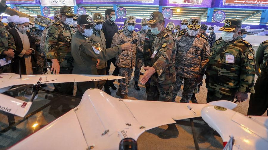 In this photo released on Wednesday, Jan. 6, 2021 by the Iranian army, a drone is launched during a military exercise in undisclosed location in Iran. On Tuesday, the Iranian military began a wide-ranging, two-day aerial drill in the country's north, state media reported, featuring combat and surveillance unmanned aircraft, as well as naval drones dispatched from vessels in Iran's southern waters. (Iranian Army via AP)