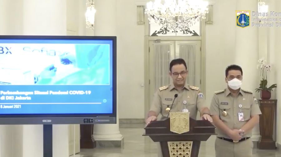 Gubernur DKI Jakarta Anies Baswedan dan Wakil Gubernur DKI Jakarta Ahmad Riza Patria saat konferensi pers Perkembangan Situasi Pandemi COVID-19 di DKI Jakarta. (Tangkapan Layar Youtube