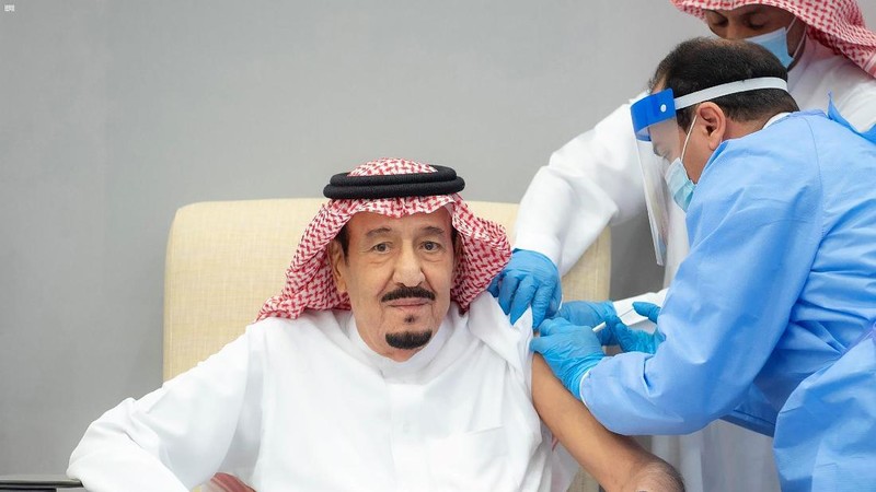 In this photo released by Saudi Press Agency, SPA, Saudi Arabia's King Salman receives the first dose of the Pfizer COVID-19 vaccine in Neom, Saudi Arabia, Friday, Jan. 8, 2021. (Saudi Press Agency via AP)