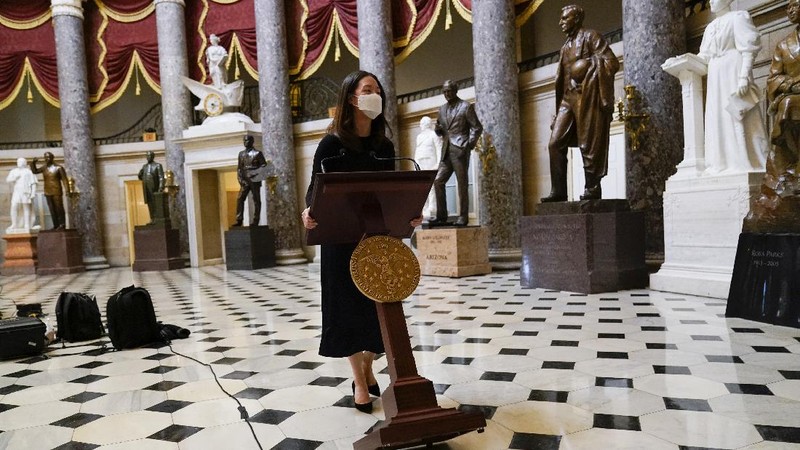 Speaker of the House Nancy Pelosi, D-Calif., leads the final vote of the impeachment of President Donald Trump for his role in inciting an angry mob to storm the Congress last week, at the Capitol in Washington, Wednesday, Jan. 13, 2021. (AP Photo/J. Scott Applewhite)