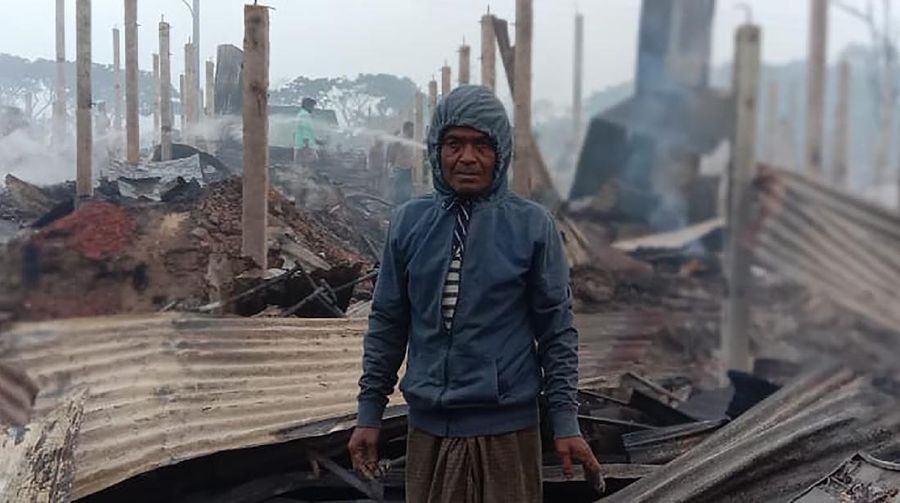 This frame grab from video shows flames rising after a fire broke out in Nayapara Camp in Cox's Bazar district, Bangladesh, Thursday, Jan. 14, 2021. A fire raced through a sprawling Rohingya refugee camp in southern Bangladesh on Thursday, destroying hundreds of homes, officials said. No casualties were reported. The UNHCR said more than 550 homes sheltering about 3,500 people as well as 150 shops were either totally or partially destroyed in the fire.  (AP Photo)