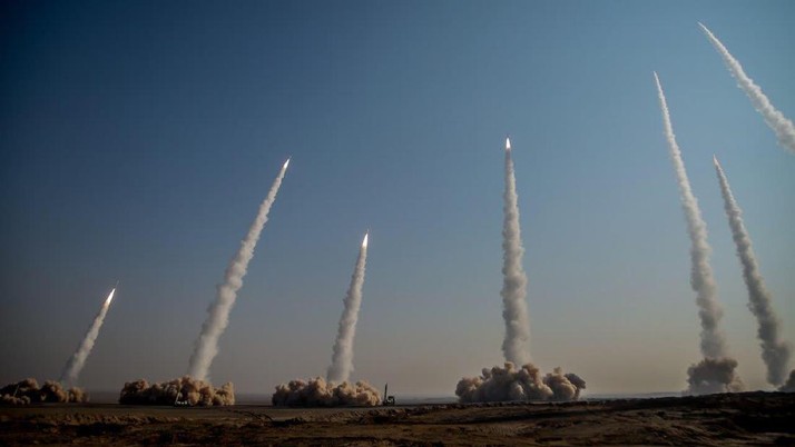 In this photo released on Friday, Jan. 15, 2021, by the Iranian Revolutionary Guard, missiles are launched in a drill in Iran. Iran's paramilitary Revolutionary Guard forces on Friday held a military exercise involving ballistic missiles and drones i
