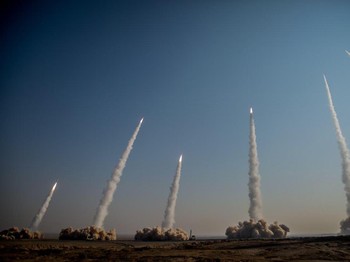 In this photo released on Friday, Jan. 15, 2021, by the Iranian Revolutionary Guard, missiles are launched in a drill in Iran. Iran's paramilitary Revolutionary Guard forces on Friday held a military exercise involving ballistic missiles and drones i