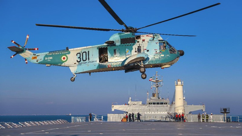 In this image released Thursday, Jan. 14, 2021, by the Iranian Army, a missile is launched from a warship during a naval drill. Iran fired cruise missiles Thursday as part of the drill in the Gulf of Oman, state media reported, amid heightened tensions with the U.S. (Iranian Army via AP)