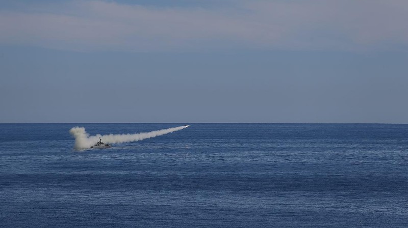 In this image released Thursday, Jan. 14, 2021, by the Iranian Army, a missile is launched from a warship during a naval drill. Iran fired cruise missiles Thursday as part of the drill in the Gulf of Oman, state media reported, amid heightened tensions with the U.S. (Iranian Army via AP)