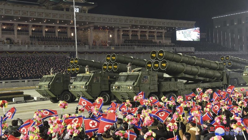 In this photo provided by the North Korean government, North Korean leader Kim Jong Un waves as Kim attended a military parade, marking the ruling party congress, at Kim Il Sung Square in Pyongyang, North Korea Thursday, Jan. 14, 2021. Independent journalists were not given access to cover the event depicted in this image distributed by the North Korean government. The content of this image is as provided and cannot be independently verified. Korean language watermark on image as provided by source reads: 