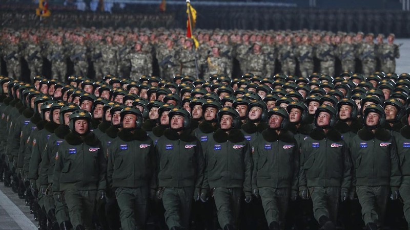 In this photo provided by the North Korean government, North Korean leader Kim Jong Un waves as Kim attended a military parade, marking the ruling party congress, at Kim Il Sung Square in Pyongyang, North Korea Thursday, Jan. 14, 2021. Independent journalists were not given access to cover the event depicted in this image distributed by the North Korean government. The content of this image is as provided and cannot be independently verified. Korean language watermark on image as provided by source reads: 