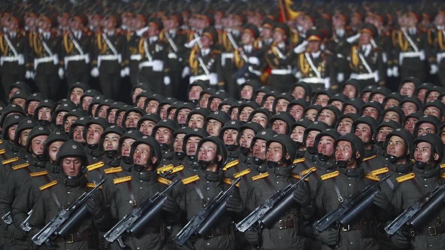 In this photo provided by the North Korean government, North Korean leader Kim Jong Un waves as Kim attended a military parade, marking the ruling party congress, at Kim Il Sung Square in Pyongyang, North Korea Thursday, Jan. 14, 2021. Independent journalists were not given access to cover the event depicted in this image distributed by the North Korean government. The content of this image is as provided and cannot be independently verified. Korean language watermark on image as provided by source reads: 