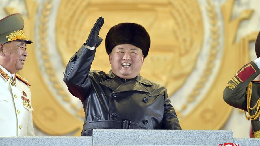 In this photo provided by the North Korean government, North Korean leader Kim Jong Un waves as Kim attended a military parade, marking the ruling party congress, at Kim Il Sung Square in Pyongyang, North Korea Thursday, Jan. 14, 2021. Independent journalists were not given access to cover the event depicted in this image distributed by the North Korean government. The content of this image is as provided and cannot be independently verified. Korean language watermark on image as provided by source reads: 