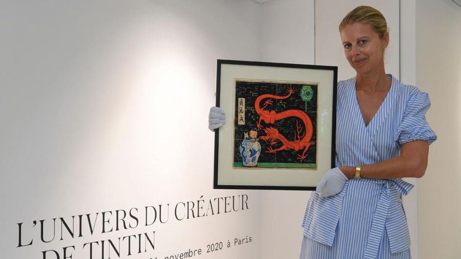Lukisan Tintin karya seniman asal Belgia, Herge, terjual senilai 3,2 juta euro atau sekitar Rp 66 miliar. (AP/Michel Euler)