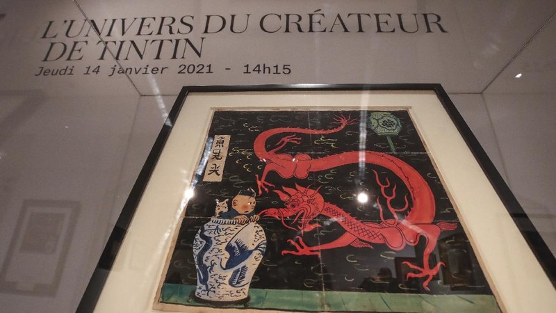 Lukisan Tintin karya seniman asal Belgia, Herge, terjual senilai 3,2 juta euro atau sekitar Rp 66 miliar. (AP/Michel Euler)