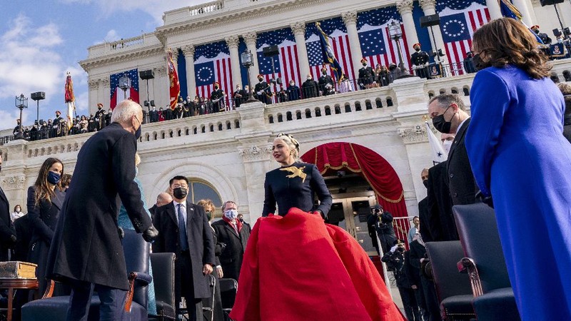 Lady Gaga arrives to sing the National Anthem at the inauguration of U.S. President-elect Joe Biden on the West Front of the U.S. Capitol on Wednesday, Jan. 20, 2021 in Washington. (Win McNamee /Pool Photo via AP)