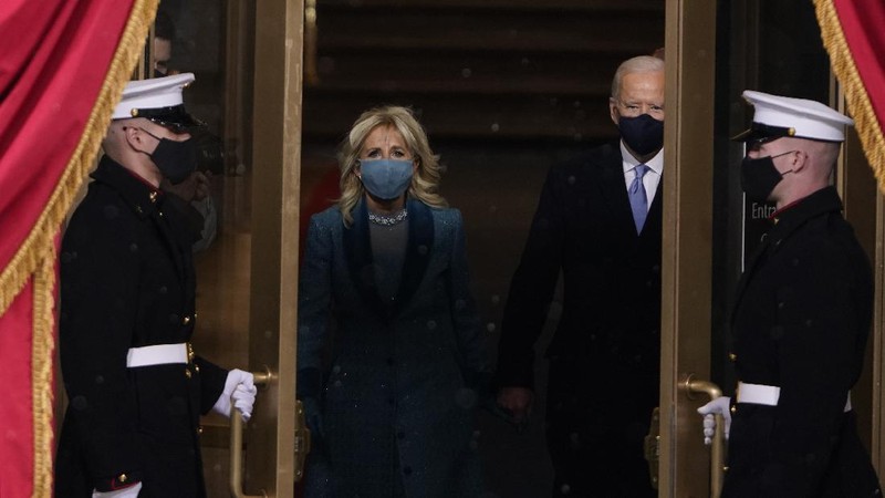 President-elect Joe Biden and his wife Jill, walk out for the 59th Presidential Inauguration at the U.S. Capitol in Washington, Wednesday, Jan. 20, 2021.(AP Photo/Patrick Semansky, Pool)