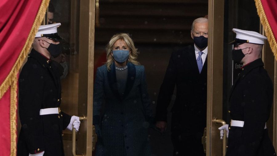 President-elect Joe Biden and his wife Jill, walk out for the 59th Presidential Inauguration at the U.S. Capitol in Washington, Wednesday, Jan. 20, 2021.(AP Photo/Patrick Semansky, Pool)