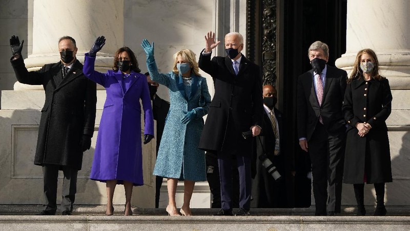 President-elect Joe Biden and his wife Jill, walk out for the 59th Presidential Inauguration at the U.S. Capitol in Washington, Wednesday, Jan. 20, 2021.(AP Photo/Patrick Semansky, Pool)