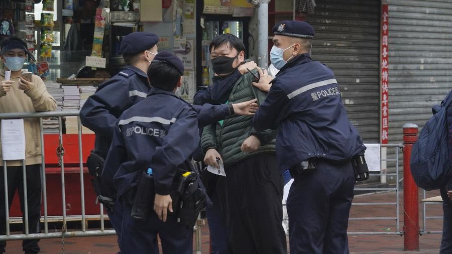 A closed area of Jordan district is seen in Hong Kong, Saturday, Jan. 23, 2021. Thousands of Hong Kong residents were locked down Saturday in an unprecedented move to contain a worsening outbreak in the city, authorities said. (AP Photo/Kin Cheung)
