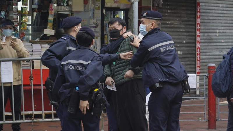 A closed area of Jordan district is seen in Hong Kong, Saturday, Jan. 23, 2021. Thousands of Hong Kong residents were locked down Saturday in an unprecedented move to contain a worsening outbreak in the city, authorities said. (AP Photo/Kin Cheung)