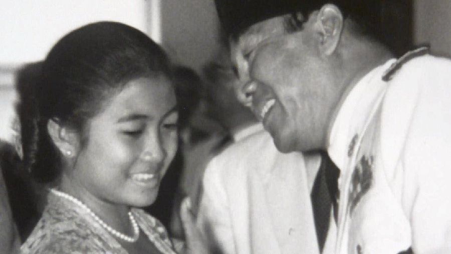 FILE--Megawati Sukarnoputri, left, is embraced by her father and Indonesia's first president Sukarno at the State Palace in Jakarta on Jan. 10, 1960. Megawati, now 54, has assumed her late father's mantle and is set to move back into the palace where she grew up. The legislature removed President Abdurrahman Wahid on Monday, July 23, 2001. Megawati, who had been vice president, was sworn in as president. (AP Photo)