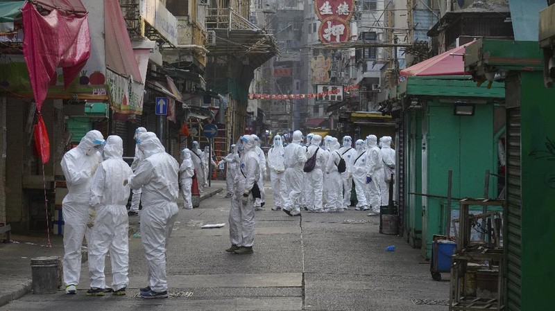 A closed area of Jordan district is seen in Hong Kong, Saturday, Jan. 23, 2021. Thousands of Hong Kong residents were locked down Saturday in an unprecedented move to contain a worsening outbreak in the city, authorities said. (AP Photo/Kin Cheung)