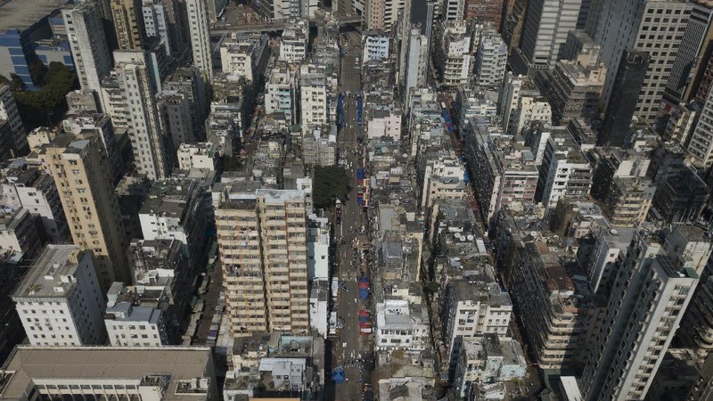 A closed area of Jordan district is seen in Hong Kong, Saturday, Jan. 23, 2021. Thousands of Hong Kong residents were locked down Saturday in an unprecedented move to contain a worsening outbreak in the city, authorities said. (AP Photo/Kin Cheung)