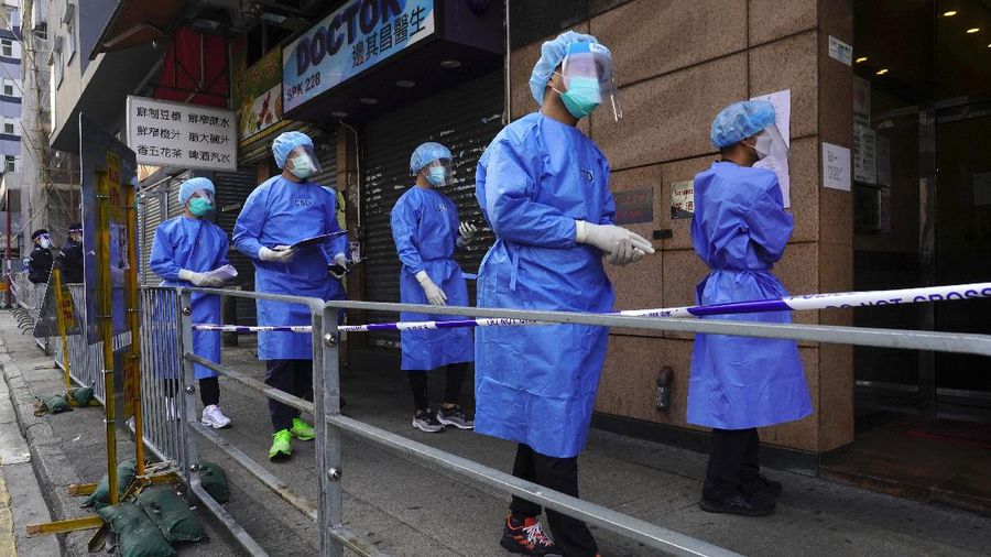 A closed area of Jordan district is seen in Hong Kong, Saturday, Jan. 23, 2021. Thousands of Hong Kong residents were locked down Saturday in an unprecedented move to contain a worsening outbreak in the city, authorities said. (AP Photo/Kin Cheung)