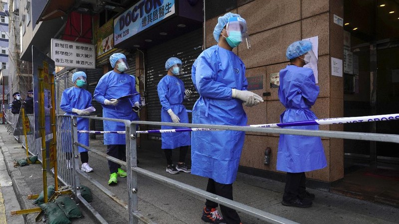 A closed area of Jordan district is seen in Hong Kong, Saturday, Jan. 23, 2021. Thousands of Hong Kong residents were locked down Saturday in an unprecedented move to contain a worsening outbreak in the city, authorities said. (AP Photo/Kin Cheung)