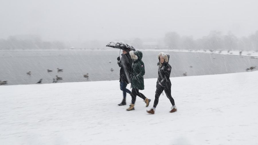 London dilanda hujan salju langka. (AP/Alberto Pezzali)