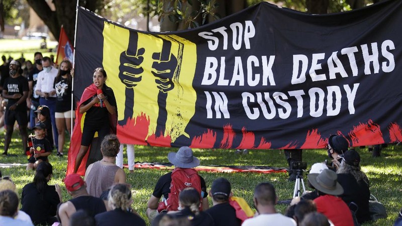 Protes peringatan hari nasional Australia. (AP/Rick Rycroft)