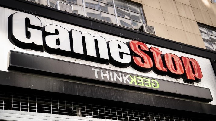 GameStop Pedestrians pass a GameStop store on 14th Street at Union Square, Thursday, Jan. 28, 2021, in the Manhattan borough of New York. Robinhood and other online trading platforms are moving to restrict trading in GameStop and other stocks that have soared recently due to rabid buying by smaller investors. GameStop stock has rocketed from below $20 to more than $400 this month as a volunteer army of investors on social media challenged big institutions who has placed market bets that the stock would fall. (AP Photo/John Minchillo)