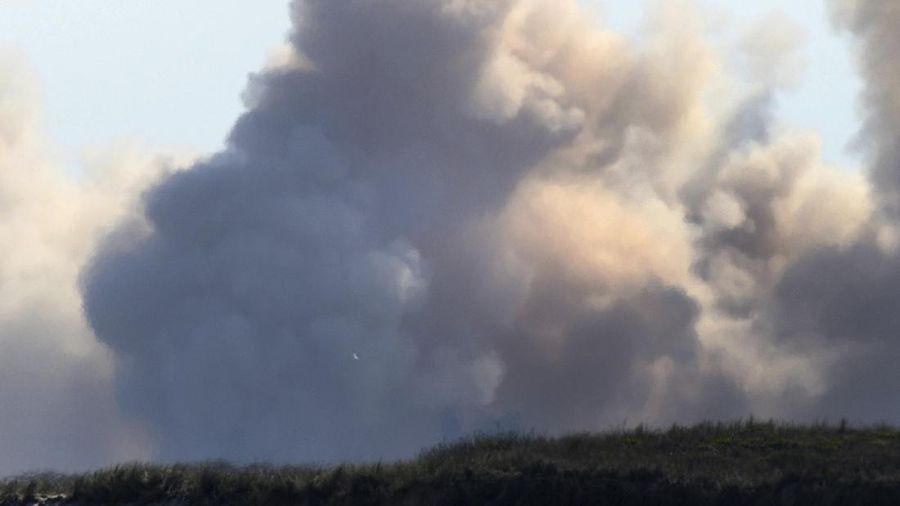 SpaceX's bullet-shaped Starship prototype rotates after a successful liftoff during a test launch, Tuesday, Feb. 2, 2021, in Boca Chica, Texas. The test flight ended in a fiery crash when the Starship attempted to land. (Miguel Roberts/The Brownsville Herald via AP)