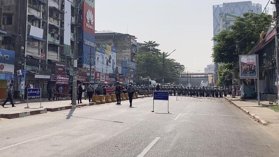 In this image made from video, protesters flash the three-fingered salute while they march Saturday, Feb. 6, 2021, in Yangon, Myanmar. The military authorities in charge of Myanmar broadened a ban on social media following this week’s coup, shutting access to Twitter and Instagram, while street protests continued to expand Saturday as people gathered again to show their opposition to the army takeover. (AP Photo)