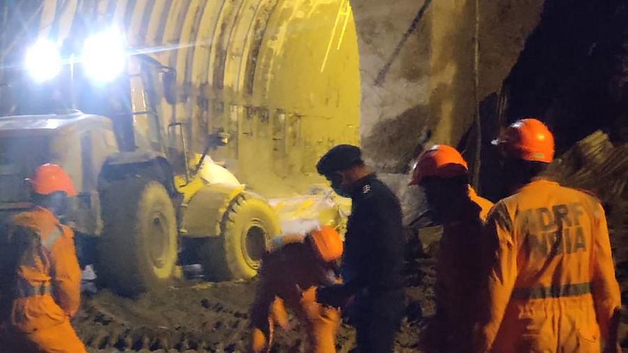 This photograph provided by National Disaster Response Force shows NDRF personnel prepare to rescue workers at one of the hydropower project at Reni village in Chamoli district of Indian state of Uttrakhund, Monday, Feb. 8, 2021. Rescue efforts continued on Monday to save 37 people after part of a glacier broke off, releasing a torrent of water and debris that slammed into two hydroelectric plants on Sunday. (National Disaster Response Force via AP)