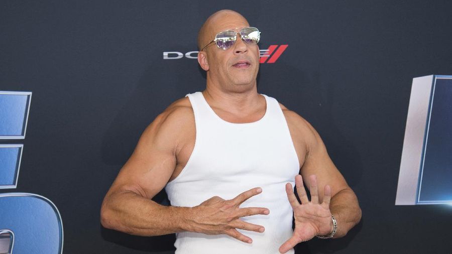 FILE - In this Jan. 31, 2020 file photo, actor Vin Diesel holds up nine fingers as he attends the the Road to 